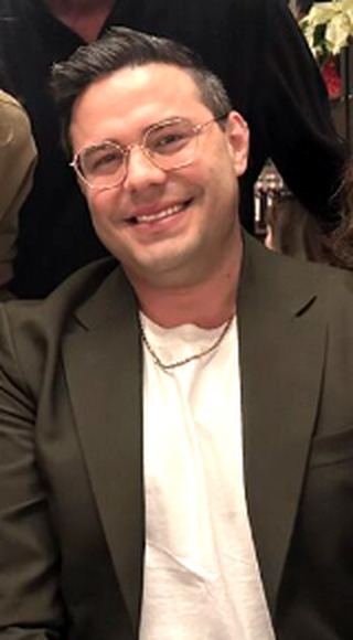 Taylor Minnis of TapClicks in a green blazer